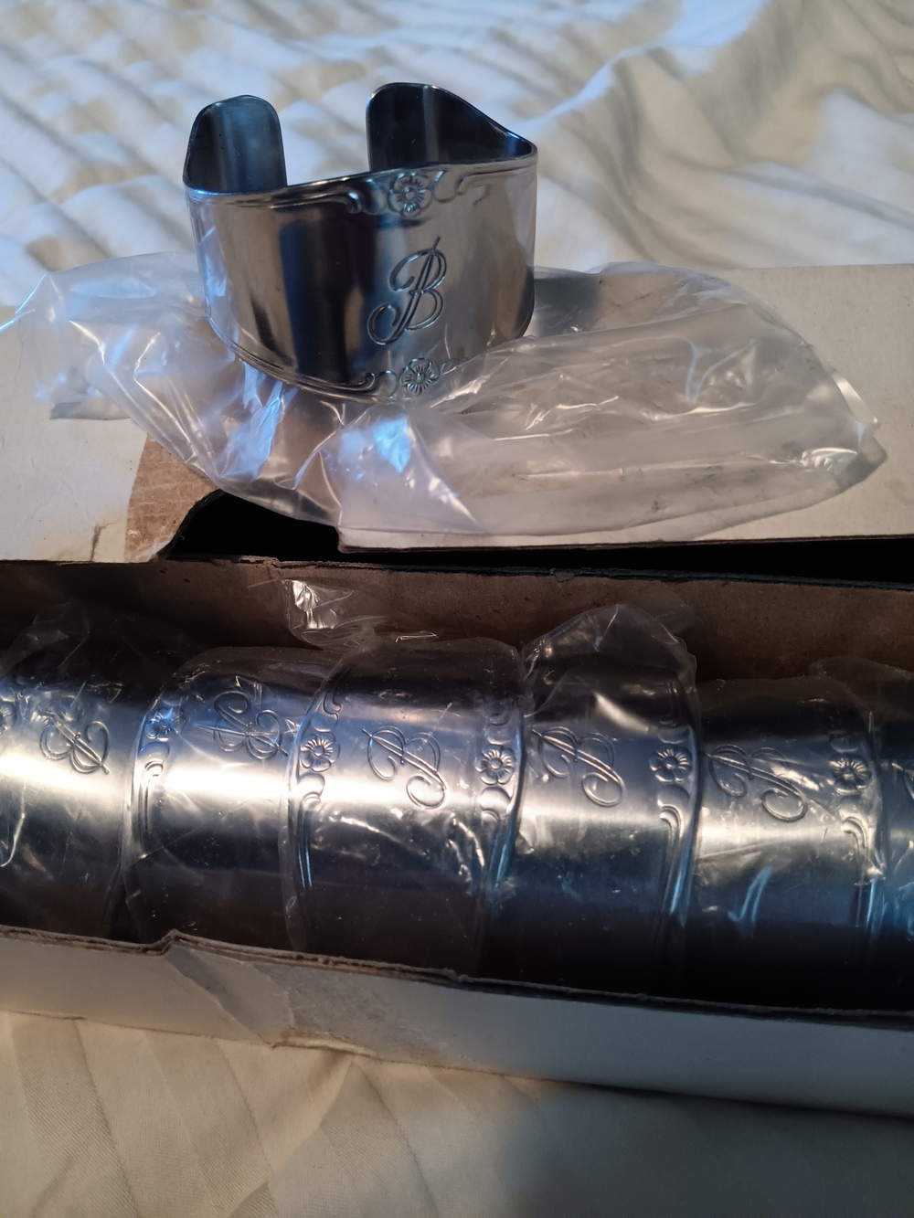 New Customcraft Stainless Steel Napkin Rings. Set Of 9.
